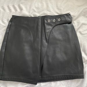Black Leather mini skirt with silver detailing on waist, size 0
